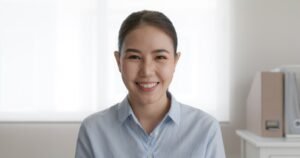Asia people happy face woman relax toothy smile look at home